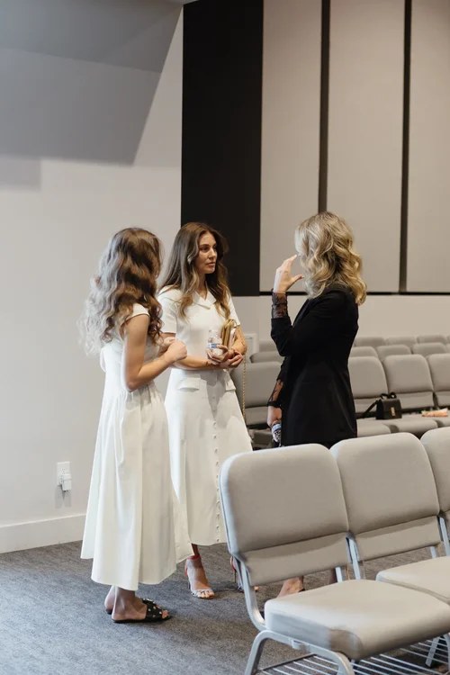 Friends sharing a moment together after church