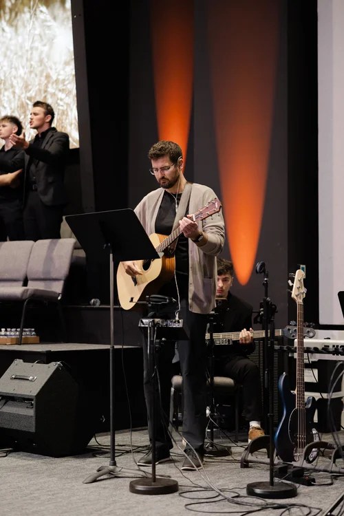 A musician serving during worship