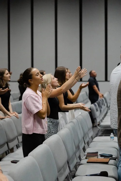Young adults gathered in worship